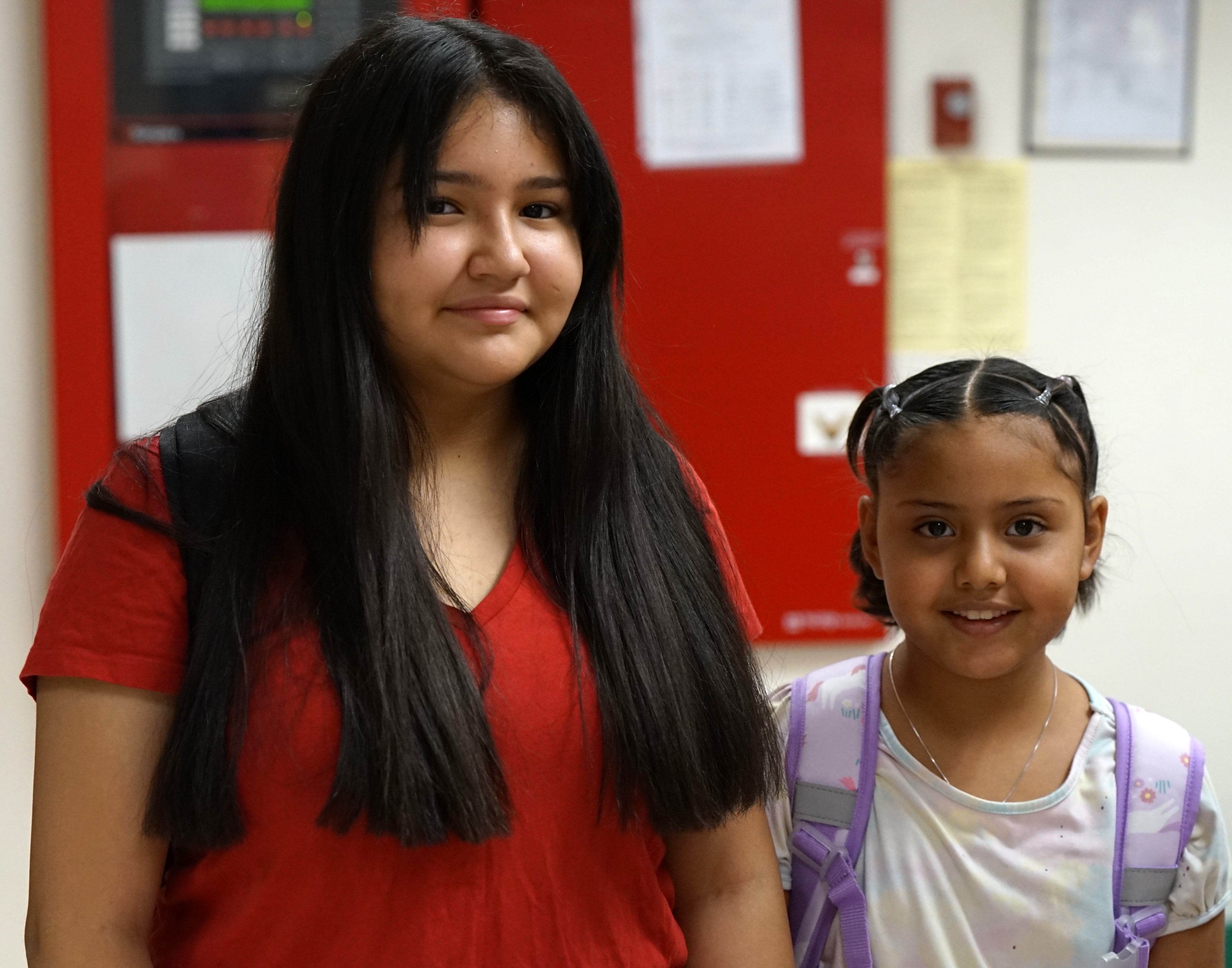 Two students smile on the first day of school